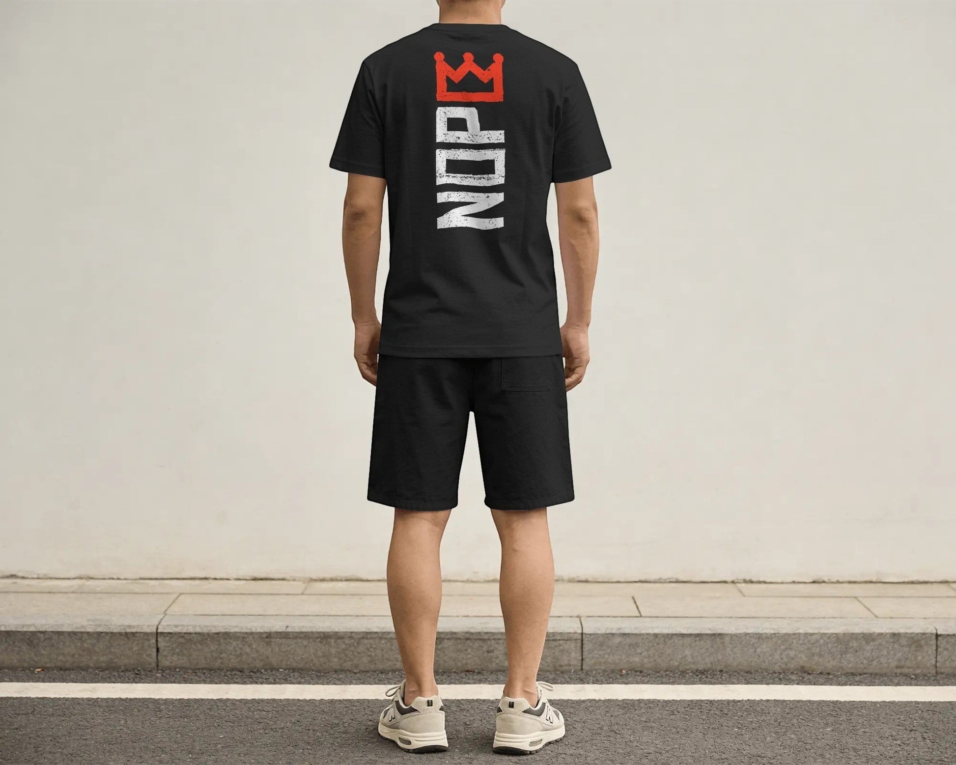 ALPHA INK PRINT CO. black cotton t-shirt with distressed red crown and white "NOPE" graphic on back.